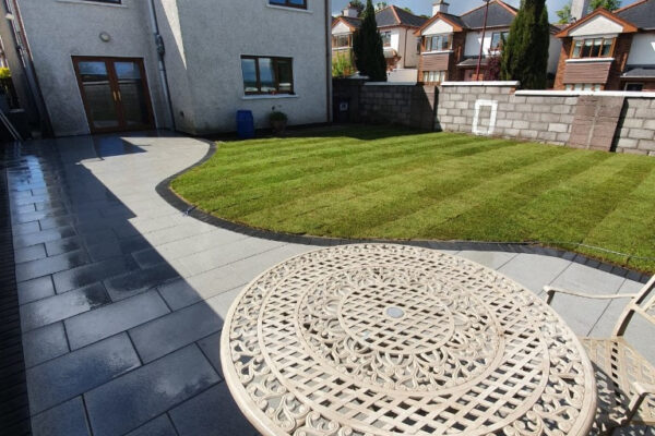 Beautiful Patio Transformation with Turf Lawn and New Walls in Togher