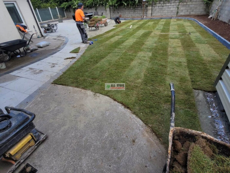 Granite Slabbed Patio with Charcoal Kerbing and Turf Lawn in Douglas, Cork