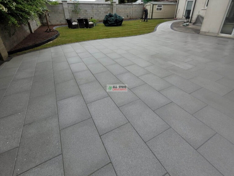 Granite Slabbed Patio with Charcoal Kerbing and Turf Lawn in Douglas, Cork