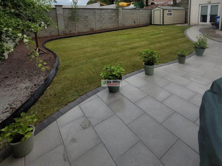 Granite Slabbed Patio with Charcoal Kerbing and Turf Lawn in Douglas, Cork