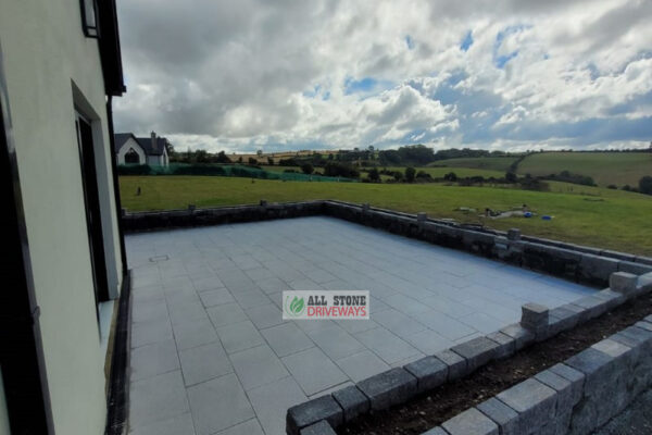 Granite Slabbed Patio with Connemara Walling in Glanmire, Co. Cork