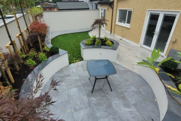 Round Porcelain Tiled Patio with Retaining Walls and Roll-on-Turf in Ballincollig, Co. Cork