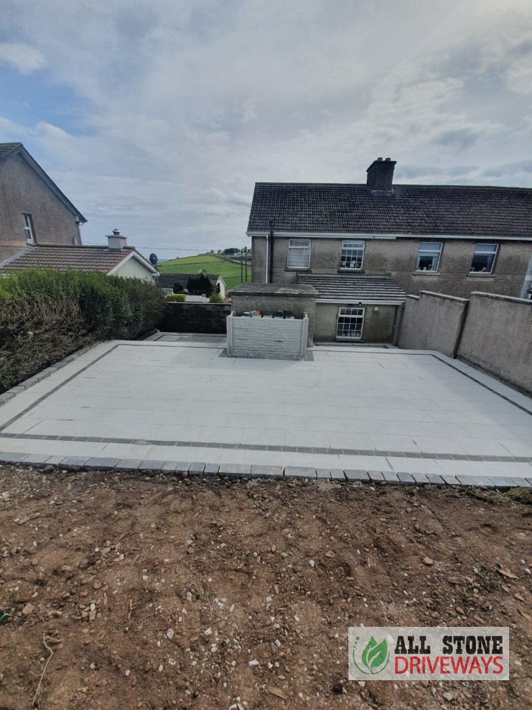 Silver Granite Patio with Brick Border in Crosshaven