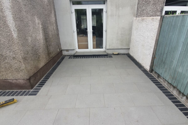 Silver Granite Patio with Slane Brick Border in Douglas, Cork