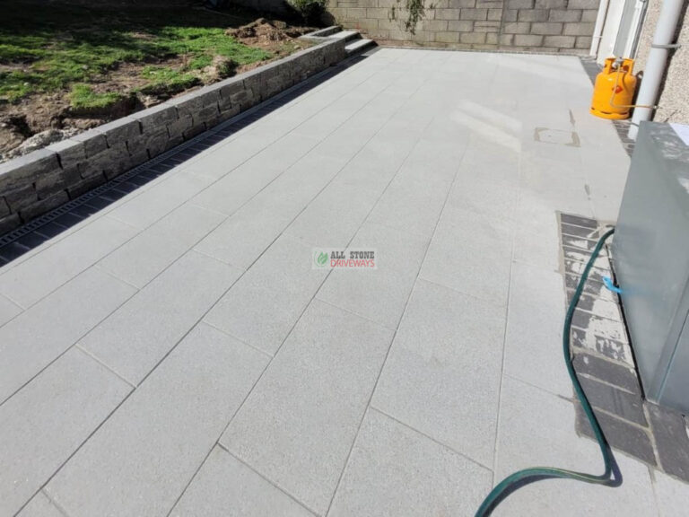 Silver Granite Slabbed Patio with Concrete Shed Base in Youghal, Co. Cork