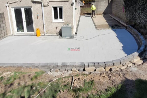 Silver Granite Slabbed Patio with Concrete Shed Base in Youghal, Co. Cork