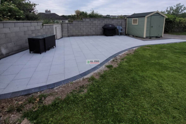 Silver Granite Slabbed Patio with Shrubbery Area in Cork City